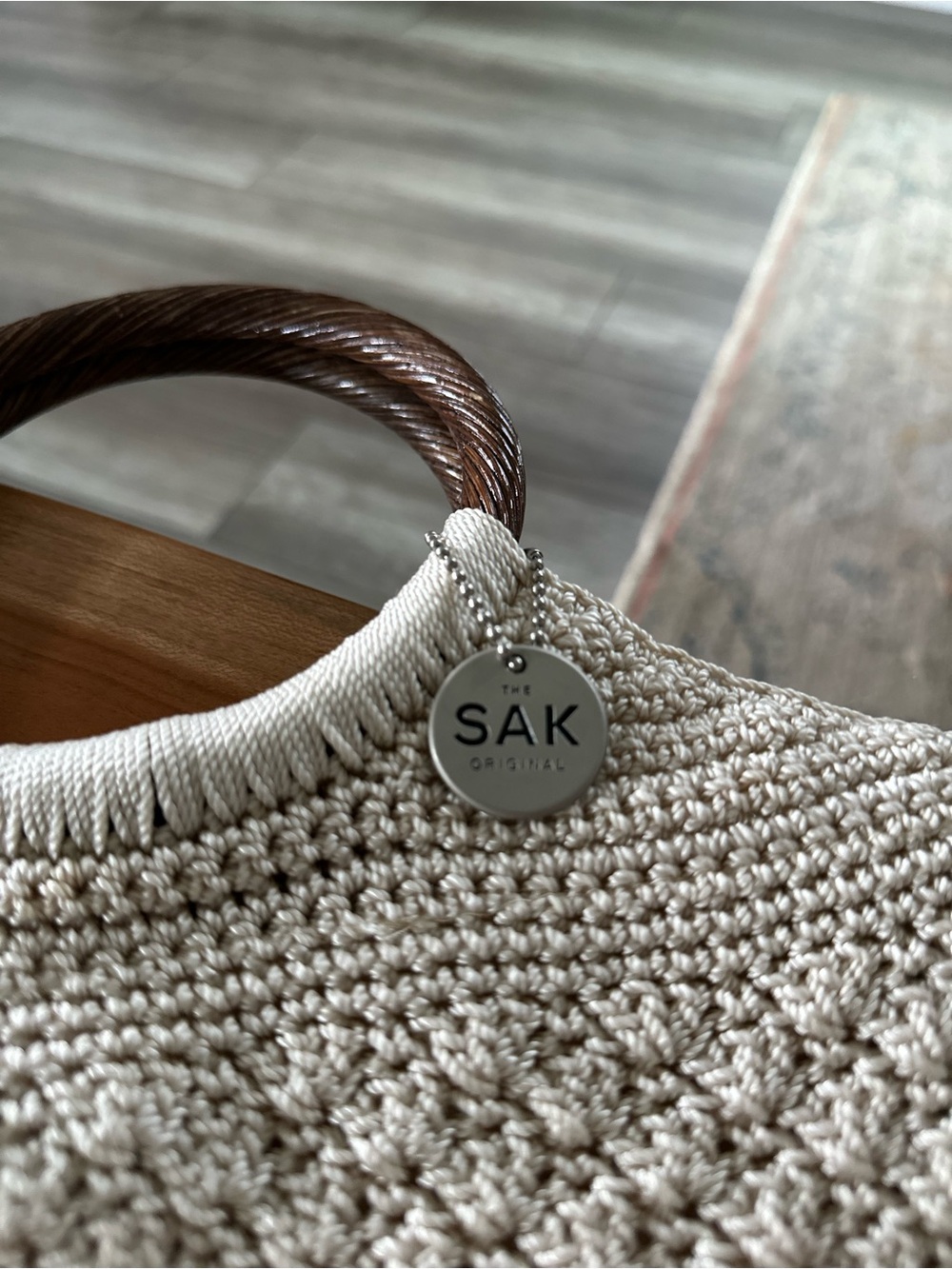 The Sak Cream Crochet Ring-Handle Tote with Brown Wooden Handles - Picture 2 of 9